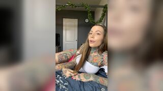 Tattooed Bitch Spreads her Wet Pussy Fingering it on Cam Video