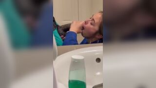 Slut taking cum from a bbc in a  public restroom.