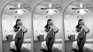 "Latina in lingerie teasing with her phone in the bedroom"