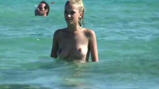 Nice nipples of cutie blonde on the beach