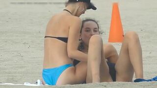 Lesbian couple caught fingering each other on the public beach