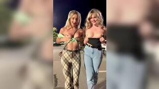 Gorgeous titties flash in the parking lot