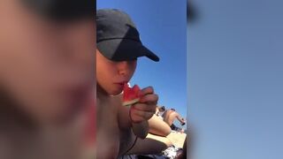 Gorgeous cute teen just flashing her perfect boobs at the beach