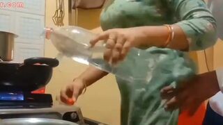 The boobs of the wife cooking the food and the chubby husband presses hard
 Indian Video