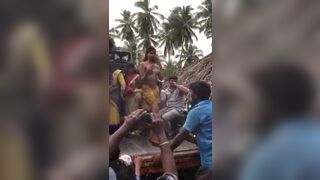 Randi girl dancing naked on tractor in front of villagers in procession
 Indian Video